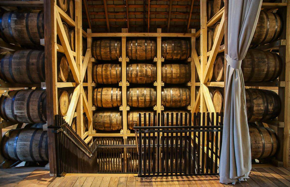 On the second flood of Hermitage Farm’s Barn8 Restaurant, there’s a staircase to the second floor lined with 100 bourbon barrels.