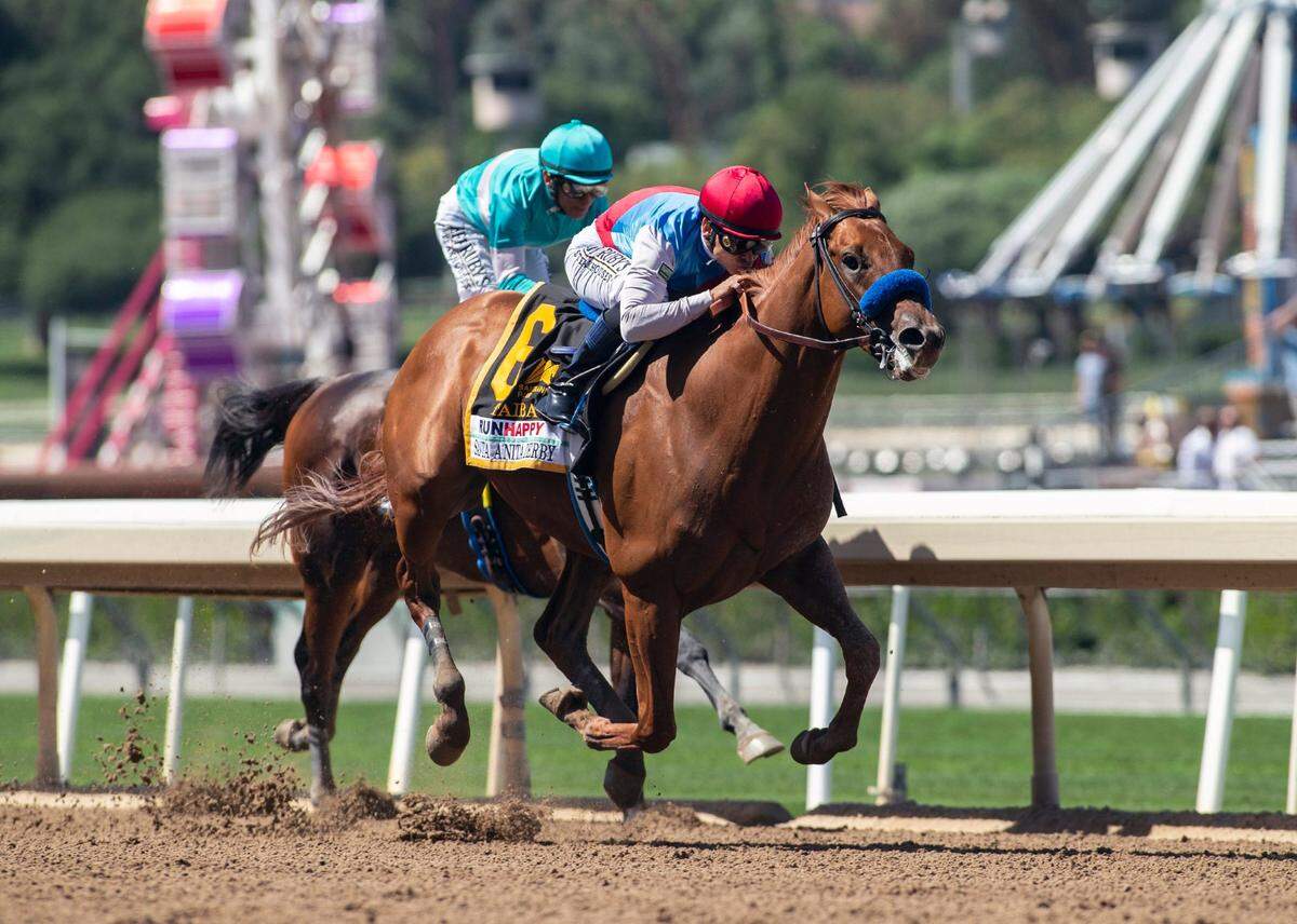 Taiba and jockey Mike Smith, outside, overpower Messier and jockey John Velazquez, inside, to win the Grade 1, $750,000 Santa Anita Derby on Saturday at Santa Anita Park in Arcadia, Calif.