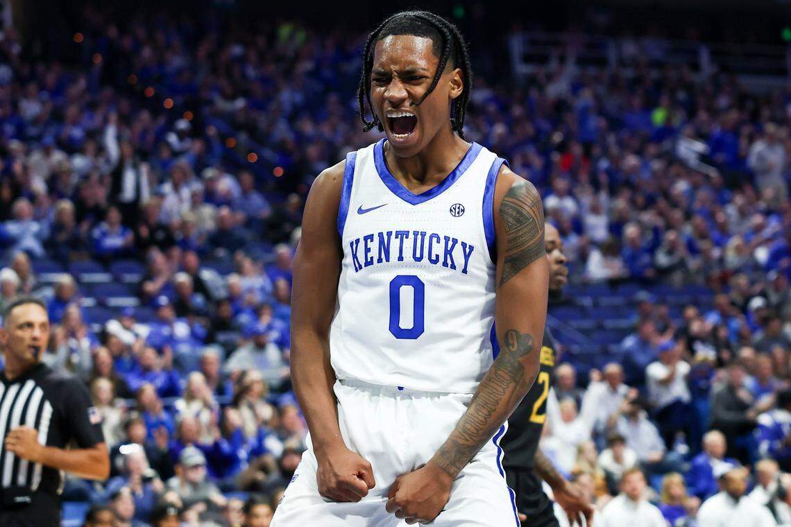Kentucky’s Rob Dillingham lets out a yell after a breakaway dunk during the first half of Friday night’s game against Texas A&M-Commerce in Rupp Arena.