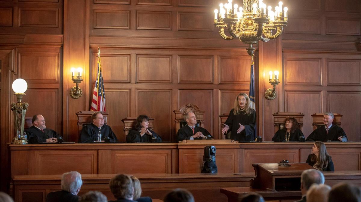 Members of the Kentucky Supreme Court listen as Justice Angela Bisig speaks after being sworn in during a ceremony in the Kentucky Supreme Court Courtroom in the state Capitol in Frankfort, Ky., on Tuesday, Jan. 10, 2023. Bisig was elected in November as the justice for the 4th Supreme Court District.