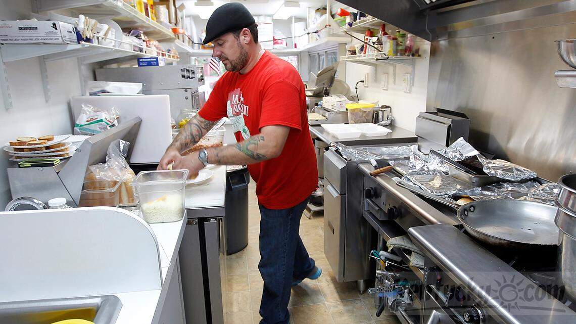 Jason Noto, owner of Mia Nonni food truck, prepared Italian food recently outside Lexington's West Sixth Brewing Co.