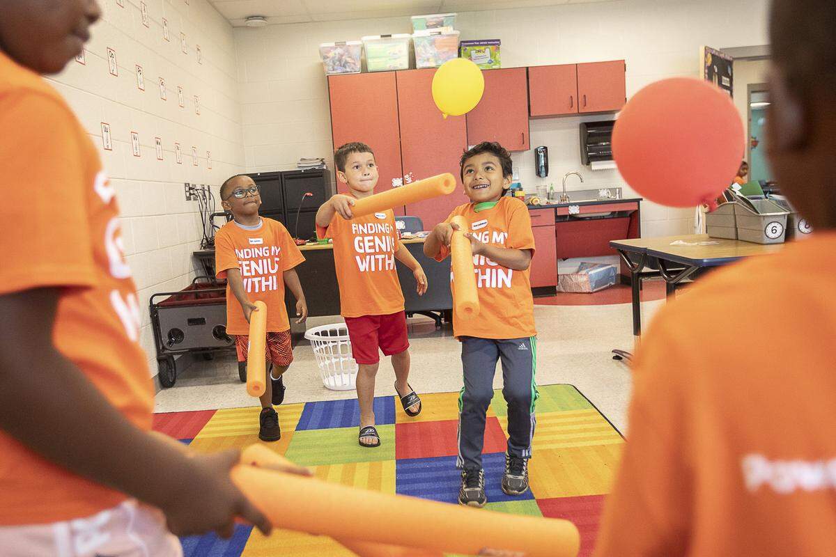 Rising first-grade students play a game before lunch during the YMCA of Central Kentucky’s Power Scholars Academy at Coventry Oak Elementary School in Lexington, Ky., Wednesday, June 19, 2019.