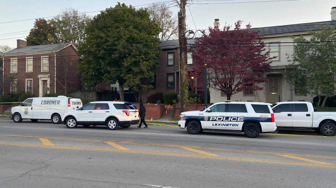 Lexington police investigate at the scene of a homicide on West Main Street.