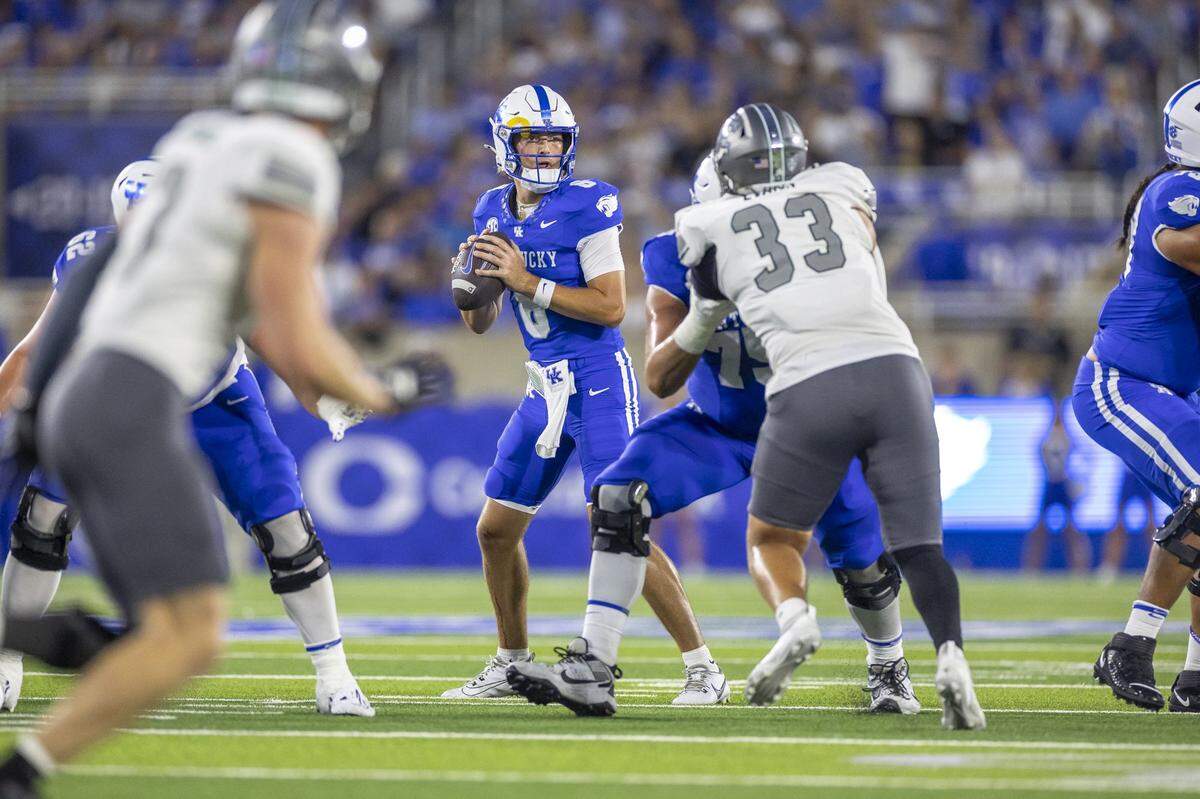 Kentucky quarterback Cutter Boley (8) looks to pass the ball during Saturday’s game against Eastern Michigan at Kroger Field.