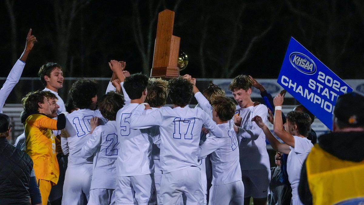 Henry Clay celebrates after defeating Louisville Collegiate 6-1 in the boys state soccer finals at Paul Laurence Dunbar High School.