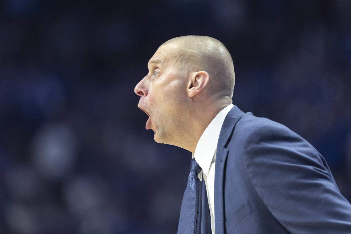 Kentucky head coach Mark Pope talks to his players during Saturday’s game against Arkansas at Rupp Arena.