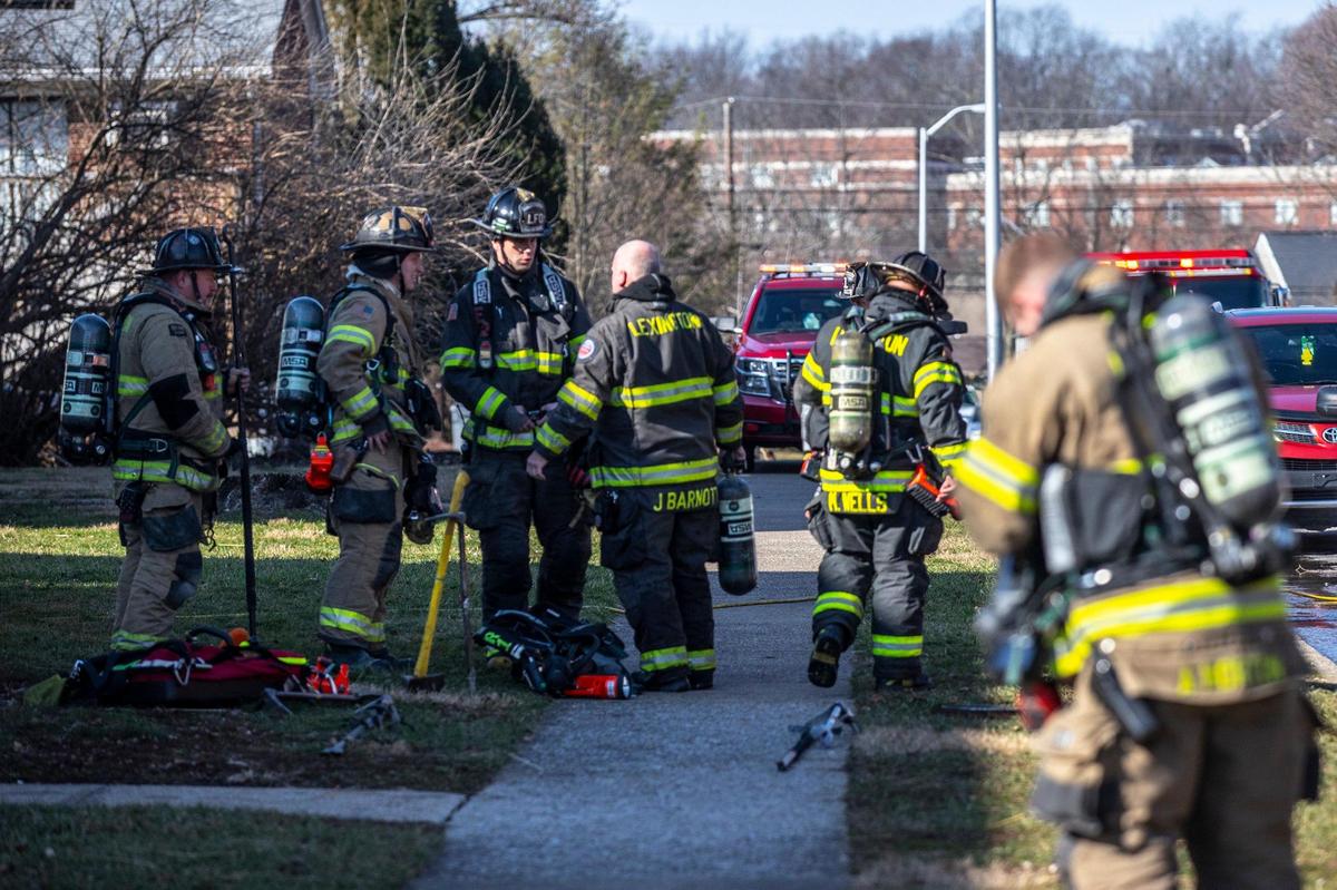 Members of the Lexington Fire Department respond to a report of a structure fire on Hill Rise Drive in Lexington, Ky., on Wednesday, February 14, 2024.