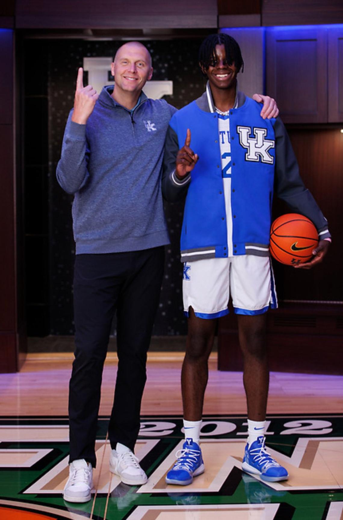 Class of 2025 college basketball recruit Caleb Wilson, right, poses with UK men’s basketball coach Mark Pope during Wilson’s official visit to Kentucky in September 2024.