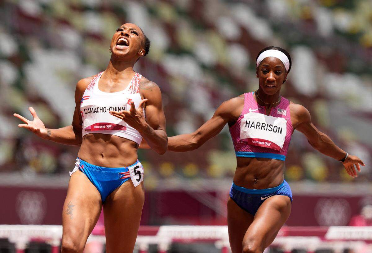 Former Kentucky Wildcats track stars Jasmine Camacho-Quinn, of Puerto Rico, left, and Kendra Harrison, of the United States, ran 1-2 in the 100-meter hurdles in the Summer Olympics in Tokyo, last year.