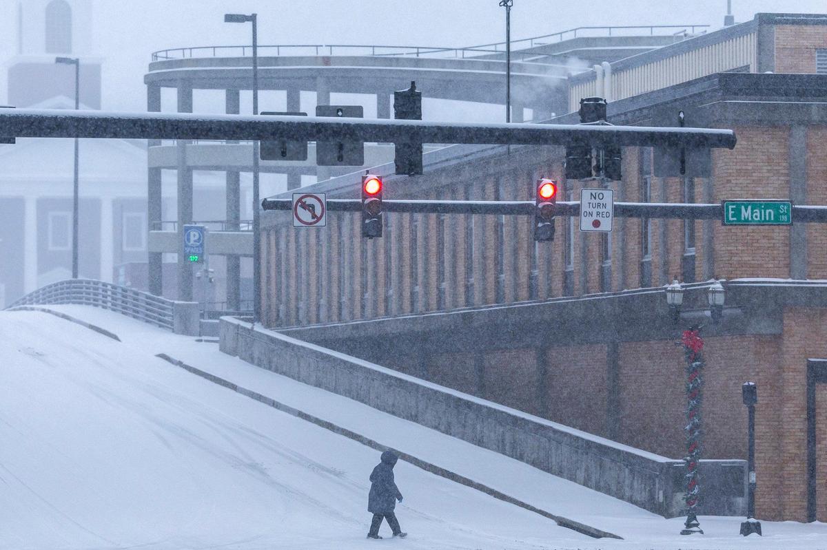A person walks in downtown Lexington, Ky., on Sunday, Jan. 5, 2025.