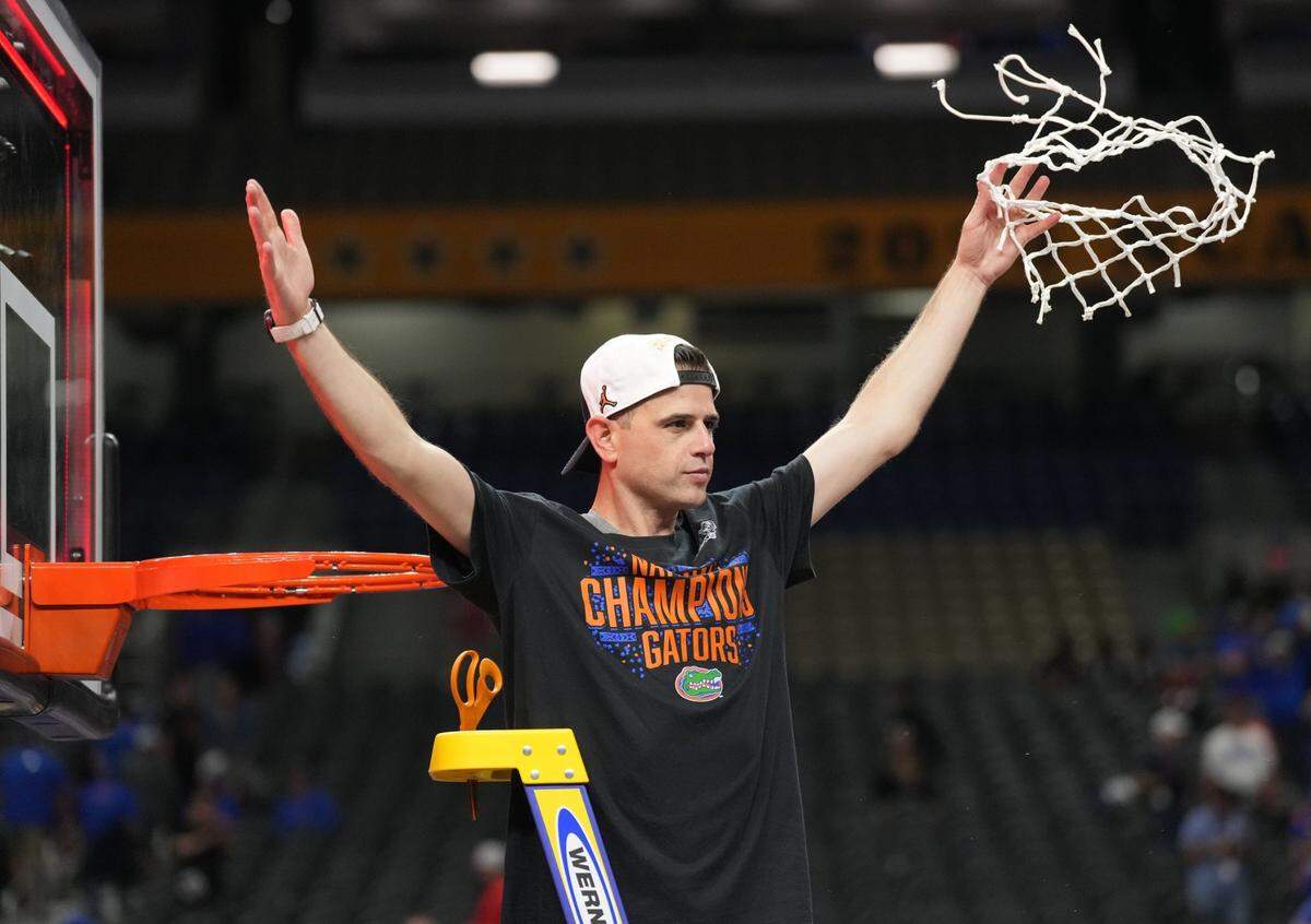 Florida coach Todd Golden exulted after the Gators beat Houston 65-63 Monday night to win the men’s basketball NCAA Tournament championship. It is Florida’s third national title in the 21st century. Only Connecticut, with five NCAA championships since Jan. 1, 2000, has won more in the current century.