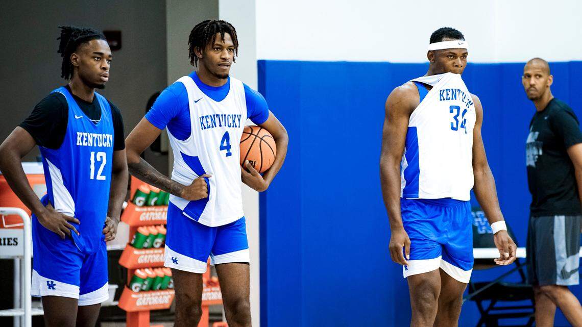 Antonio Reeves, left, Damion Collins, center, and Oscar Tshiebwe participate in one of Kentucky’s preseason practices.
