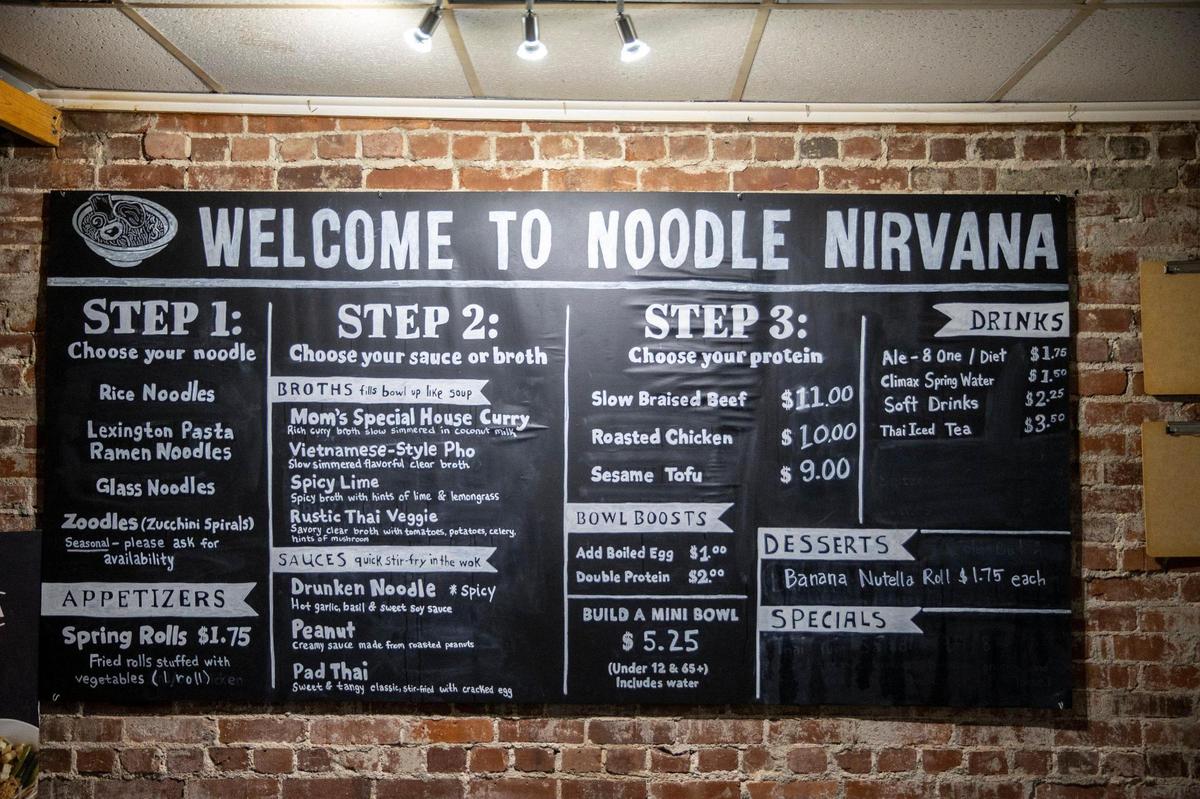 A menu board helping explain the ordering process at Berea’s Noodle Nirvana.