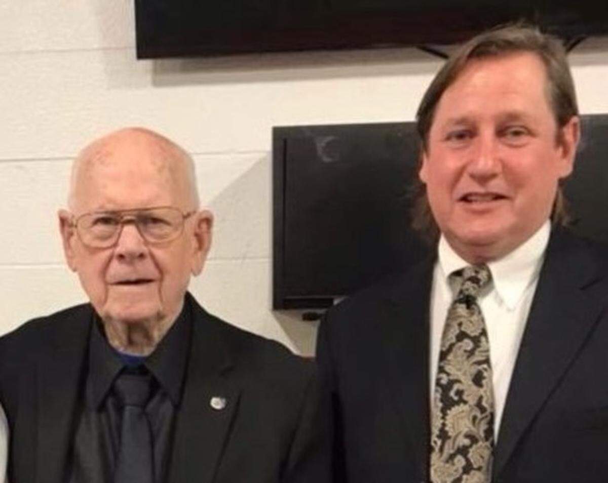 Albert Cummins, left, with his son, Clint. Albert, 93, was inducted into the 10th Region Hall of Fame and the Bracken County Athletic Hall of Fame last year.