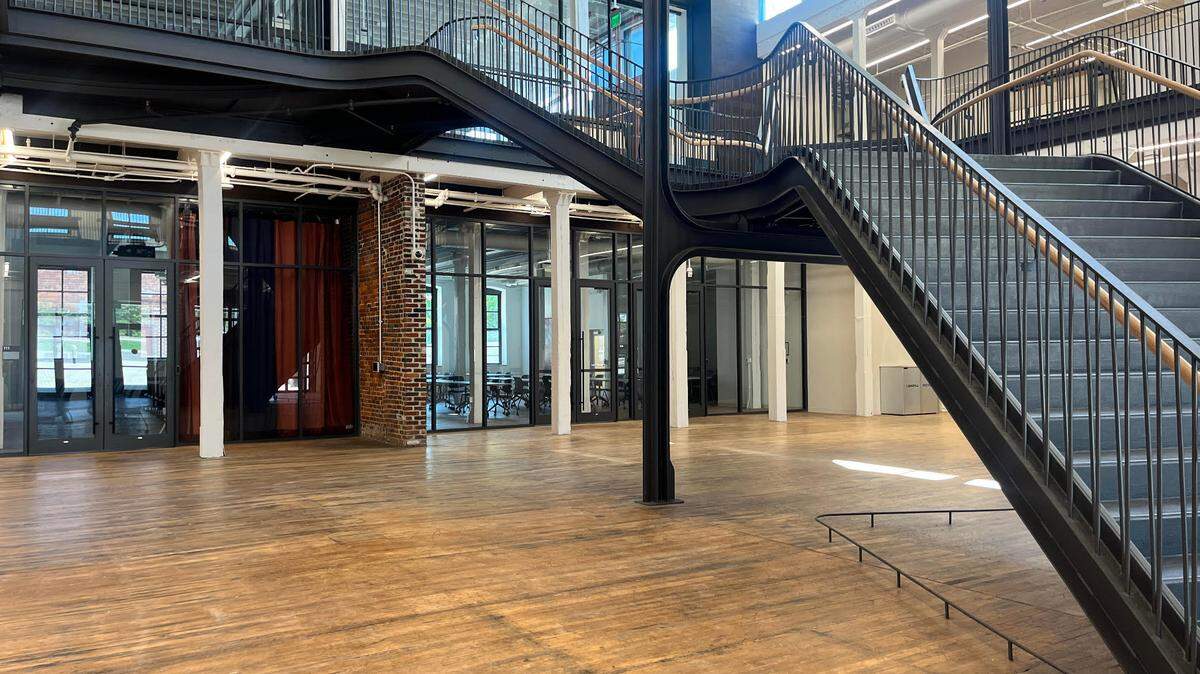 The entrance to the Gray Design Building, which features steel stairs leading to the second floor. The stairs were made in Northern Kentucky and weigh 30,000 pounds.