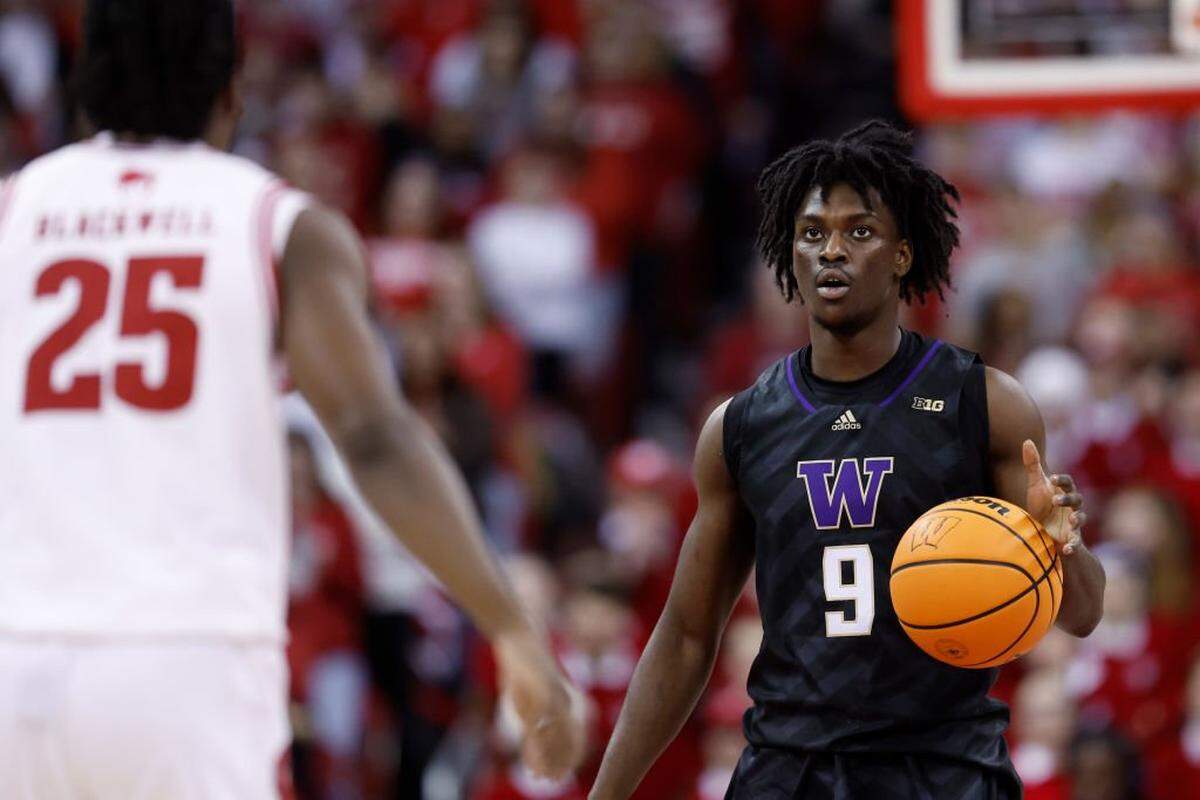 MADISON, WISCONSIN - FEBRUARY 25: Zoom Diallo #9 of the Washington Huskies dribbles up court during the first half of the game against the Wisconsin Badgers at Kohl Center on February 25, 2025 in Madison, Wisconsin. (Photo by John Fisher/Getty Images)