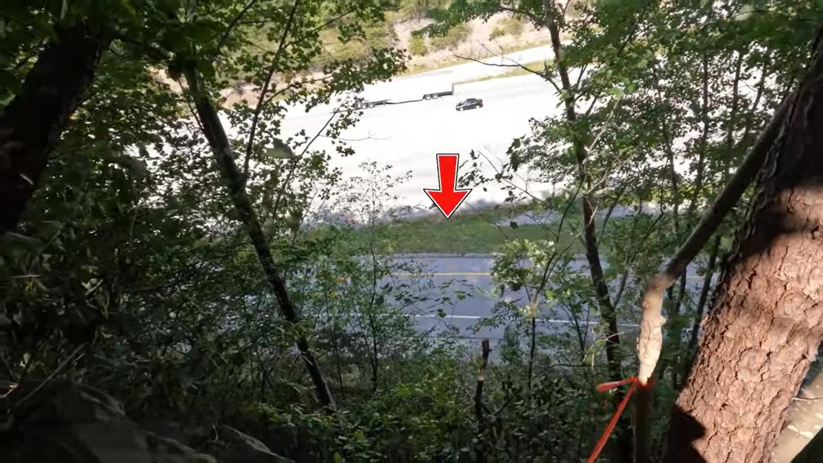 Looking down on Exit 49 of Interstate 75 in Southern Kentucky from where Fred and Sheila McCoy say Joseph Couch fired on 12 vehicles Sept. 7, 2024. The couple started hiking early in the day to reach the area and where trying to find Couch.