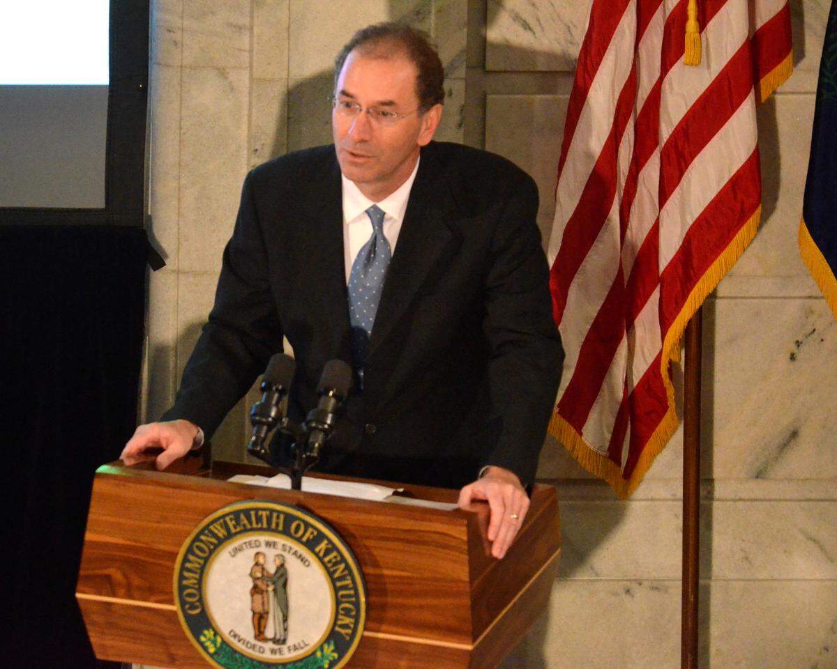 Herald-Leader columnist Tom Eblen accepts the media award in the Governor’s Awards in the Arts. The 2013 Governor’s Awards in the Arts were presented to nine entities on the morning of Oct. 29, 2013 in the Kentucky State Capitol Building in Frankfort, Ky. Photo by Rich Copley | staff.