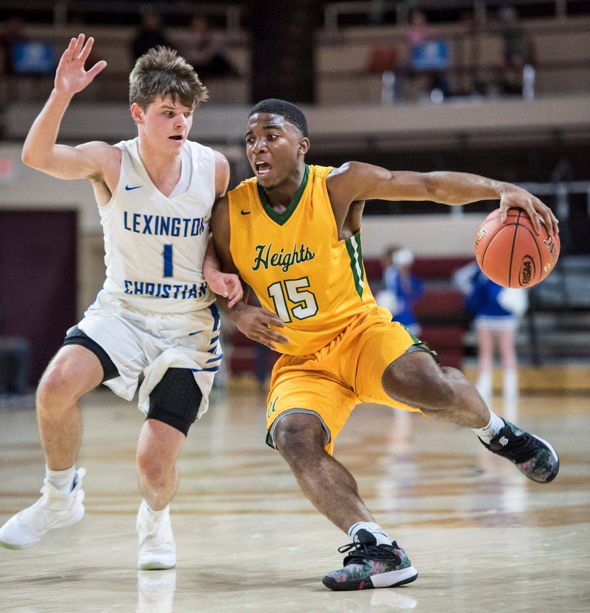 University Heights Academy star KyKy Tandy (right) is a leading candidate for this year’s Mr. Basketball award.