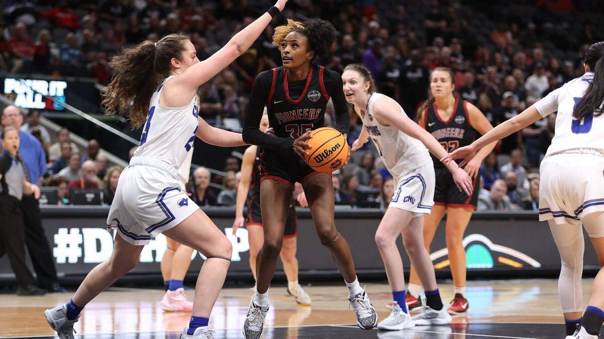 Transylvania women’s basketball senior forward Dasia Thornton gathers the ball before shooting during the NCAA Division III Women’s Basketball Tournament championship game on Saturday, April 1, 2023, at the American Airlines Center in Dallas, Texas.