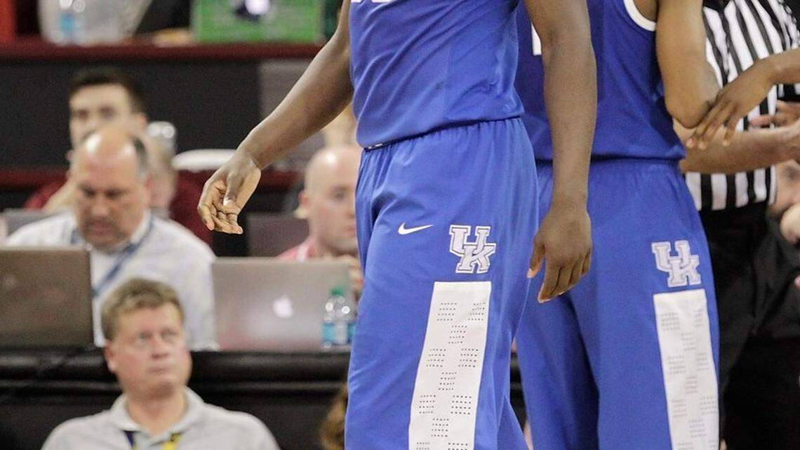 Kentucky's Julius Randle glanced at the scoreboard Saturday in the Cats' 72-67 loss to South Carolina.
