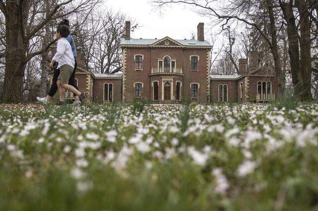 People walk along the trails at Ashland Ð the Henry Clay Estate in Lexington, Ky., on Tuesday, March 24, 2020.