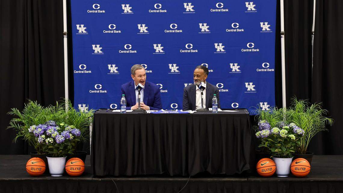 Kenny Brooks, right, speaks alongside athletics director Mitch Barnhart during his introductory press conference as the head coach of Kentucky’s women’s basketball. Brooks comes from Virginia Tech, where he led his team to a Final Four in 2023.