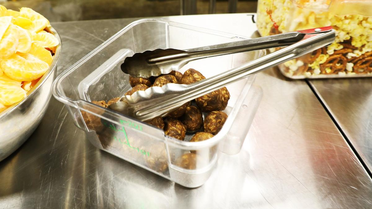 Handmade sweet and salty treats that are low in sugar and contain no fructose corn syrup are added to nutritious pre-packed school lunches customized to each student’s needs through “Packed,” a new venture from FoodChain founder Becca Self, on December 3, 2024, in Lexington, Ky.