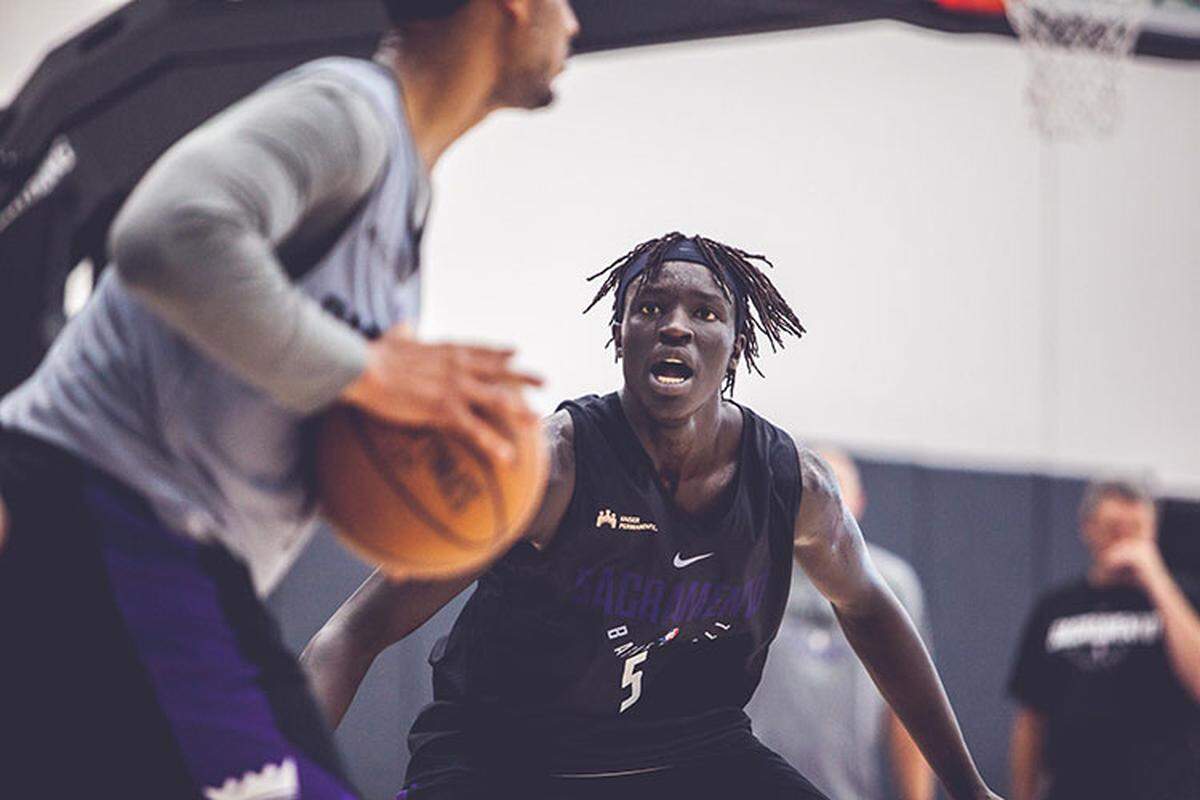 Wenyen Gabriel got down on defense during an NBA pre-draft workout in Sacramento. Gabriel is playing for the Kings' team in the NBA's Las Vegas Summer League.