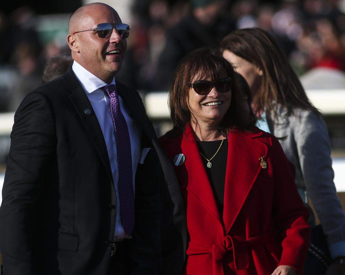 Good Magic owners Robert Edwards Jr., left, and Barbara Banke smiled after winning the Toyota Blue Grass Stakes during opening weekend at Keeneland on March 7, 2018. Good Magic will probably be one of the favorites at this Saturday's Kentucky Derby as the reigning juvenile champion.