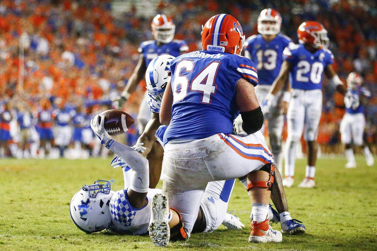 Kentucky safety Davonte Robinson scored a touchdown on a return of a fumble recovery on the final play of the game in UK’s streak-busting 27-16 win at Florida in 2018. It was the Wildcats’ first win over the Gators since 1986.