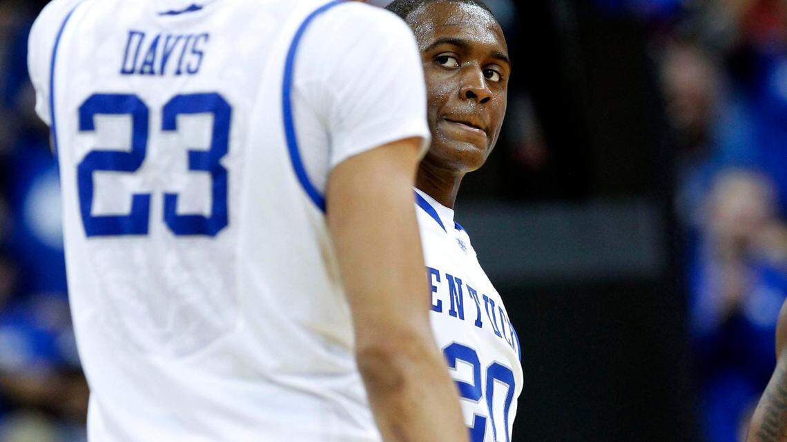 UK s Doron Lamb slapped hands with Anthony Davis, left, after a  Lamb basket as the University of Kentucky played Western Kentucky  University in the second round of the NCAA tournament played in the  KFC Yum Center in Louisville, Ky., Thursday, March 15, 2012. This  is second half action. Charles Bertram oe Staff