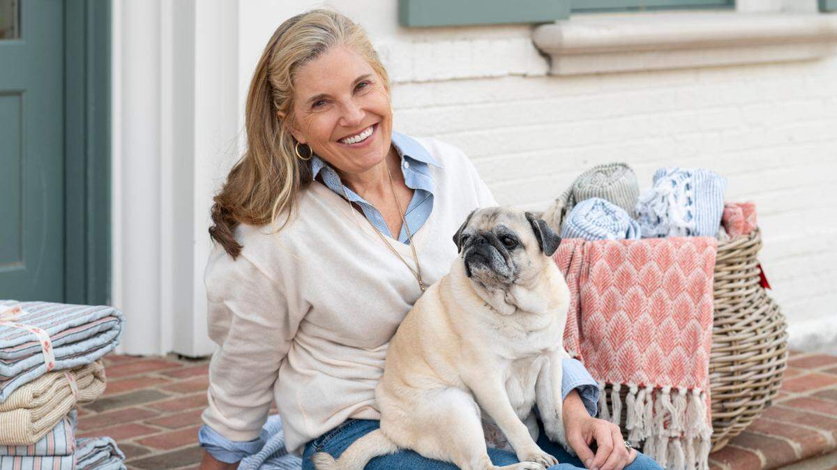 Pomegranate founder and creative director Angela Beck, with her pug Penelope, is opening a new store opening at 700 E. Main St. in Lexington on Dec. 3. Pomegranate also will have a cafe, Penny’s at Pomegranate, serving a menu created by chef Ouita Michel and wines from Beck’s Oregon vineyard.