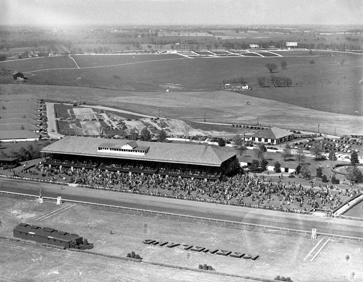 An aerial view of the second day of the 1946 Keeneland Spring Meet, April 12, 1946. This year’s Spring Meet starts Friday and it’s a sure bet there will be more in attendance at the track on opening day than the 6,000 nearly 76 years ago. In the photo, the parking lot can be seen behind the grandstand. General admission to the track was $1 for men and 50 cents for women. Today it’s $7.