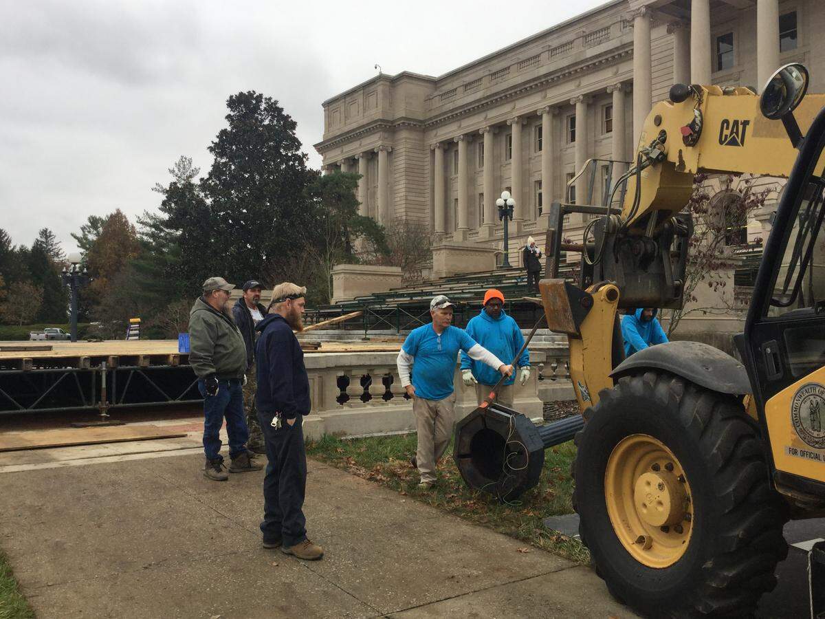 Workers get a huge stage ready in front of the Kentucky Capitol for the Dec. 10 inauguration of Andy Beshear as governor and Jacqueline Coleman as lieutenant governor.