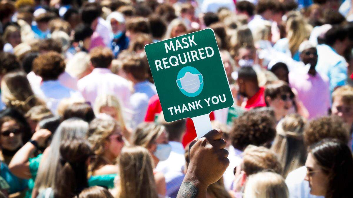Fans were required to wear masks before the 147th running of the Kentucky Oaks Friday at Churchill Downs in Louisville.
