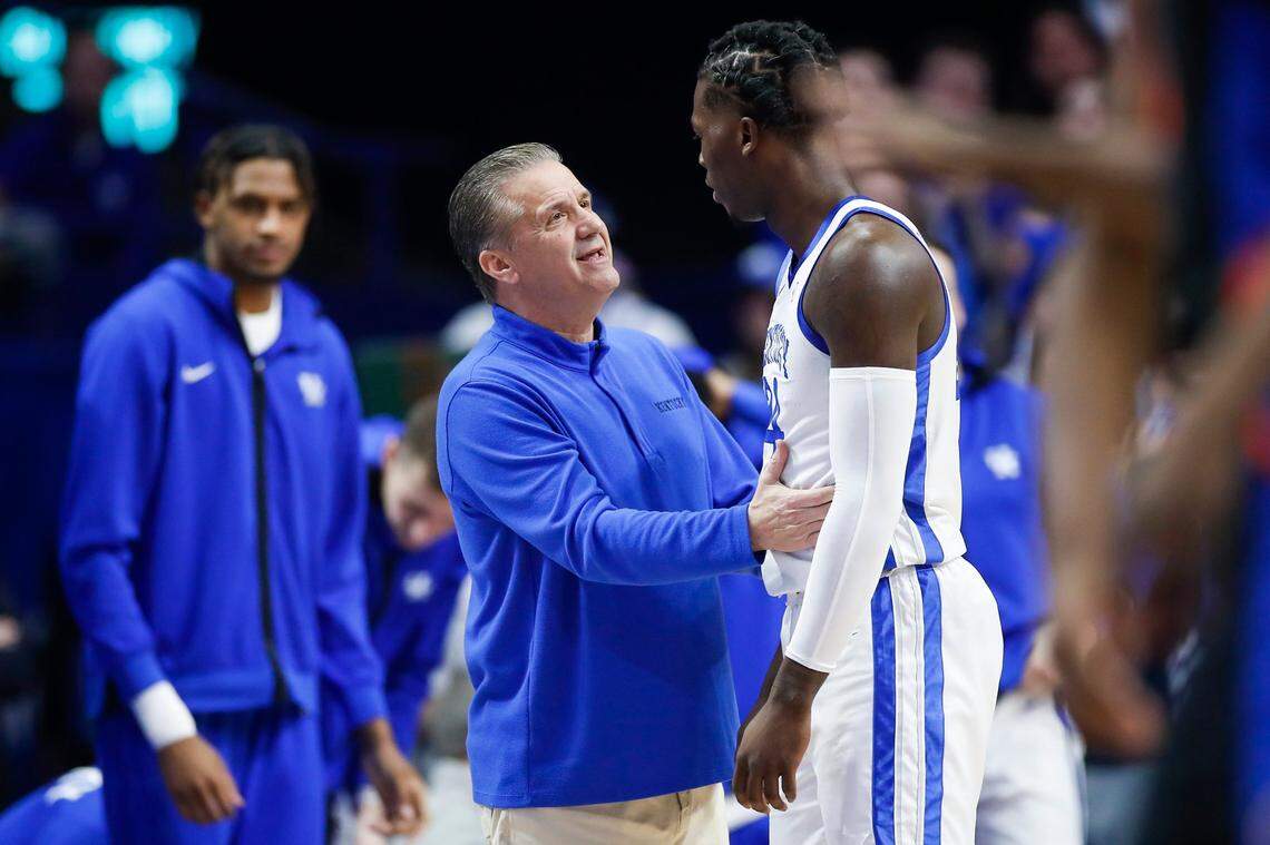 Kentucky Coach John Calipari talks with Wildcats freshman Chris Livingston during the game against the Florida Gators on Feb. 4.
