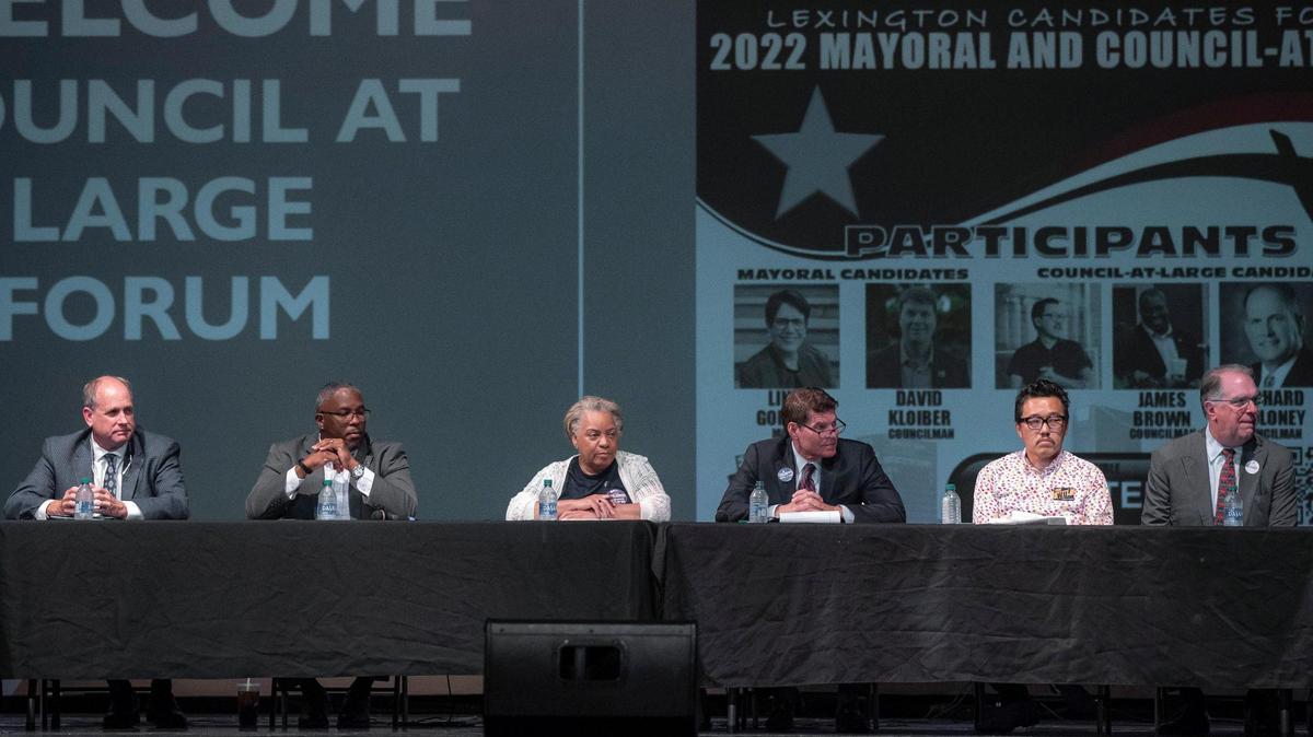 Richard Moloney, from left, James Brown, Lillie Miller-Johnson, Chuck Ellinger, Dan Wu and Bill Farmer Jr., candidates for councilor-at-large, attend a candidate forum at the Lyric Theatre and Cultural Arts Center in Lexington, Ky., on Wednesday, Sept. 14, 2022.