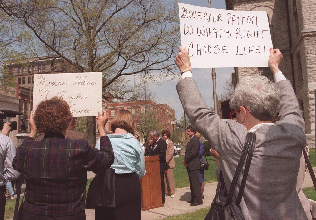 Kentucky Governor Paul Patton, surrounded by some of his supporters in the legislature, held a press conference at the Fayette County Courthouse in Lexington, Ky., on April 7, 1998, announcing his veto of HB 85, which would create a 24-hour waiting period for women seeking abortions.