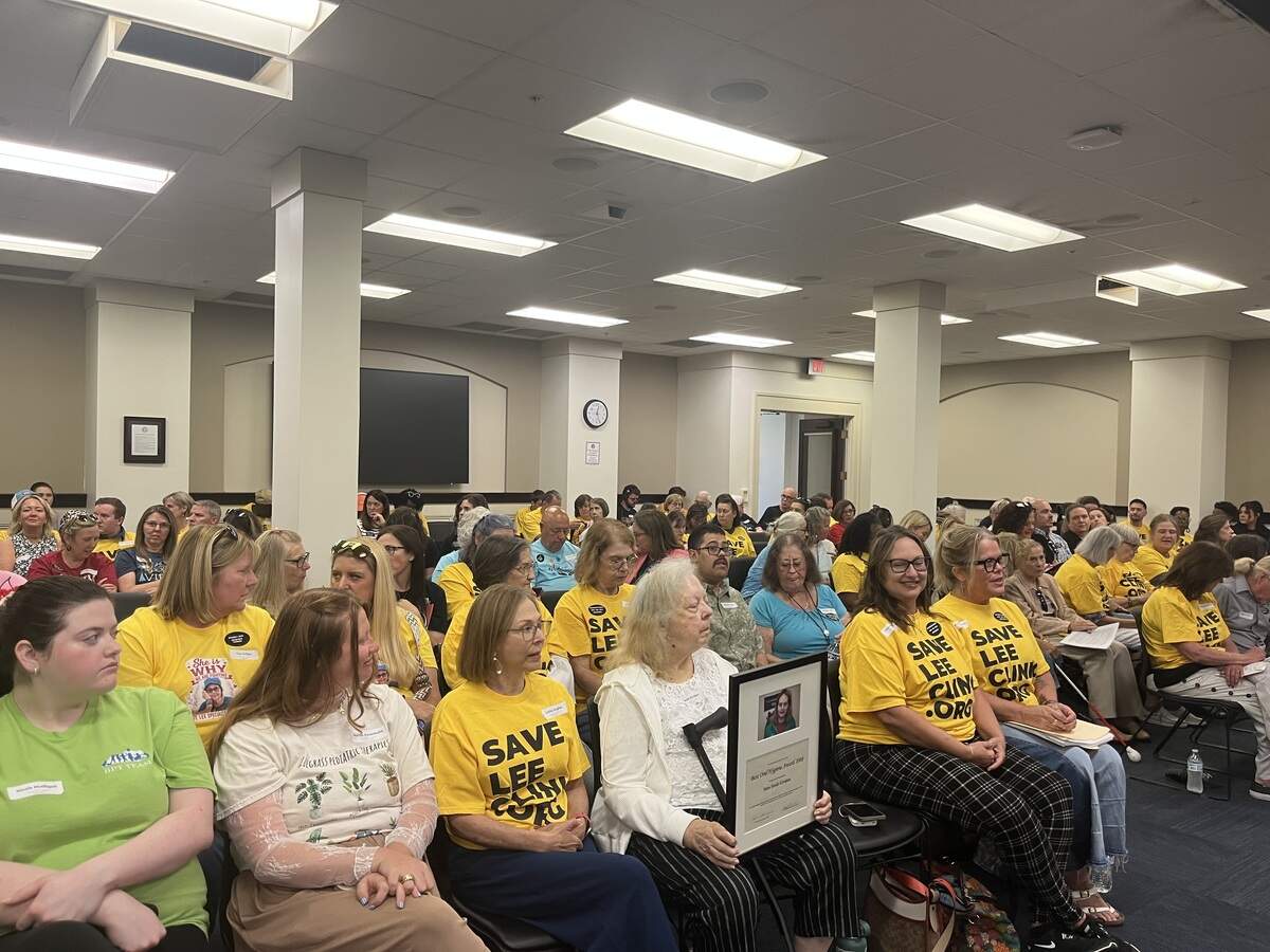 Dozens of people supporting Lee Specialty Clinic are seen in the Capitol Annex room at the Medicaid Oversight and Advisory Board meeting on June 24.