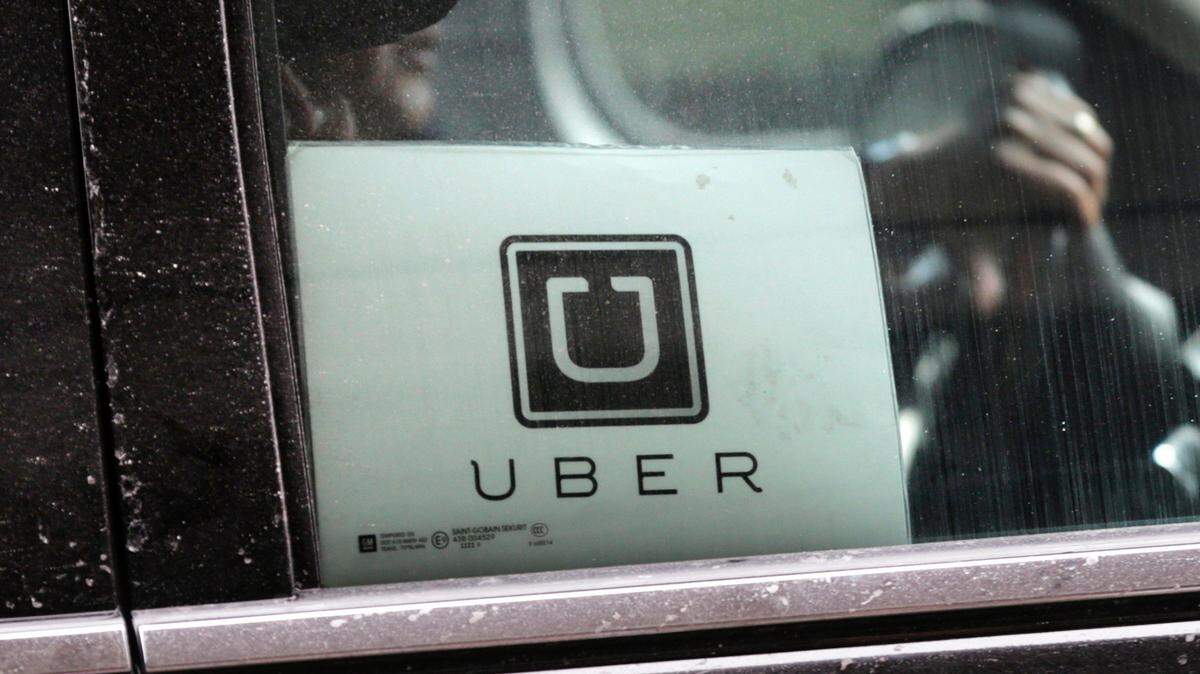 In this March 15, 2017, file photo, an Uber car drove through New York.