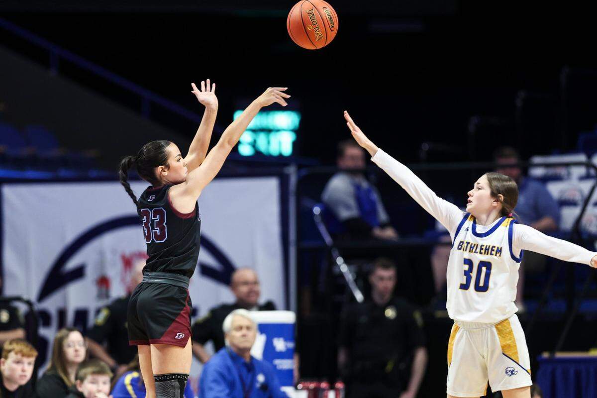 Pikeville’s Shyla Kidd fires a 3-pointer over Bethlehem’s Loren Macy on Thursday. The Panthers went 6-for-12 from beyond the arc in the first half but 0-for-10 in the second half.