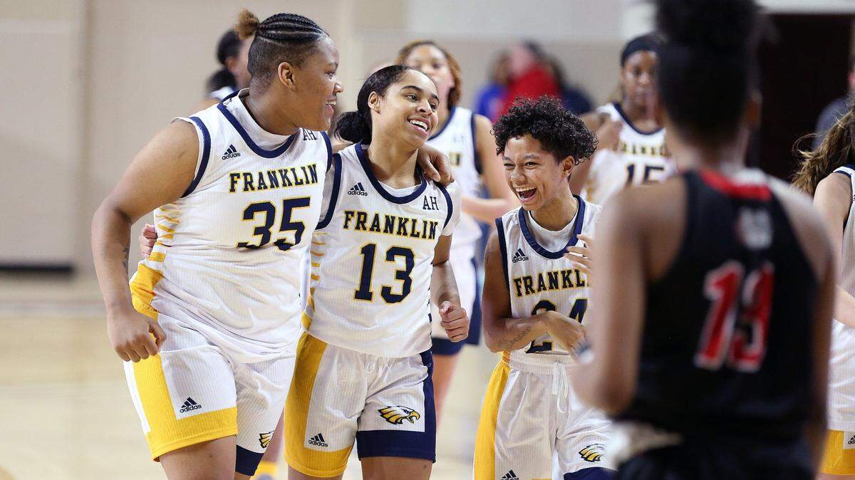 Franklin County’s Brooklynn Miles, center, celebrated with teammates during a 2020 win. Miles leads the 2021 Herald-Leader Girls’ Basketball All-State Team as its Player of the Year.