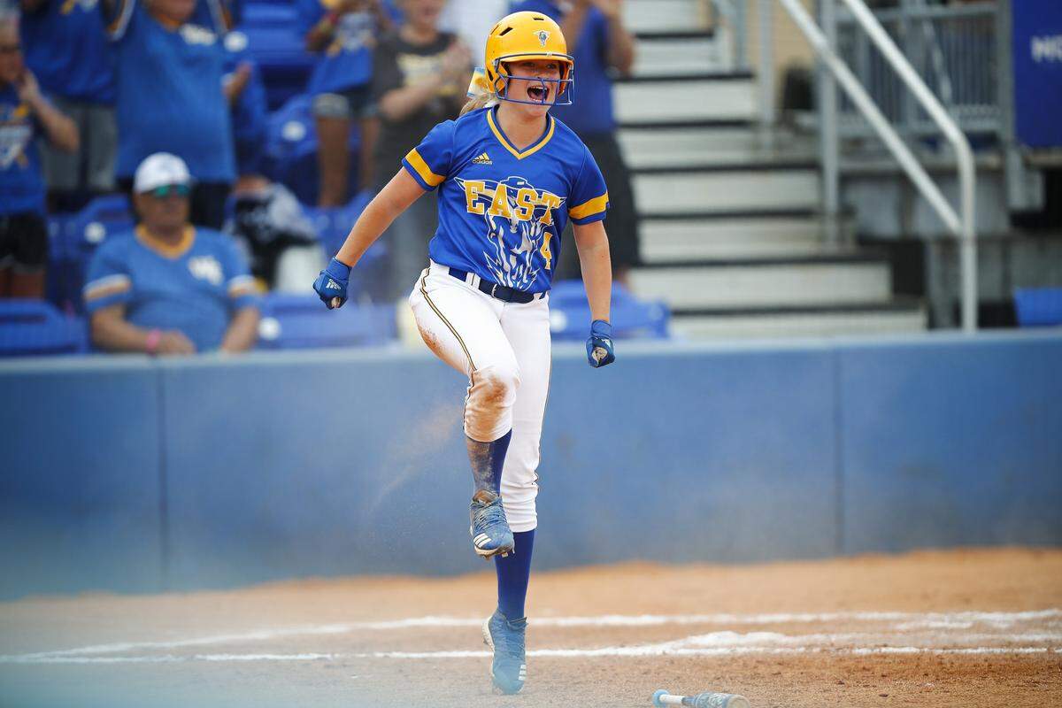 Warren East OBrien Wilson (4) celebrates after scoring a run during the KHSAA State Softball Tournament championship against Male at John Cropp Stadium in Lexington, Ky., Saturday, June 15, 2019. Male beat Warren East 6-1. 