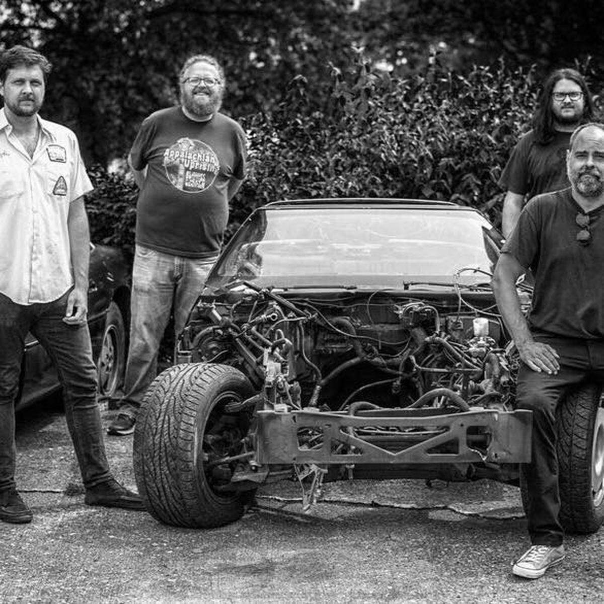 Wayne Graham members (left to right): Kenny Miles on vocals/guitar, Chris Justice on bass, Hayden Miles on vocals/drums and Lee Owen on guitar.