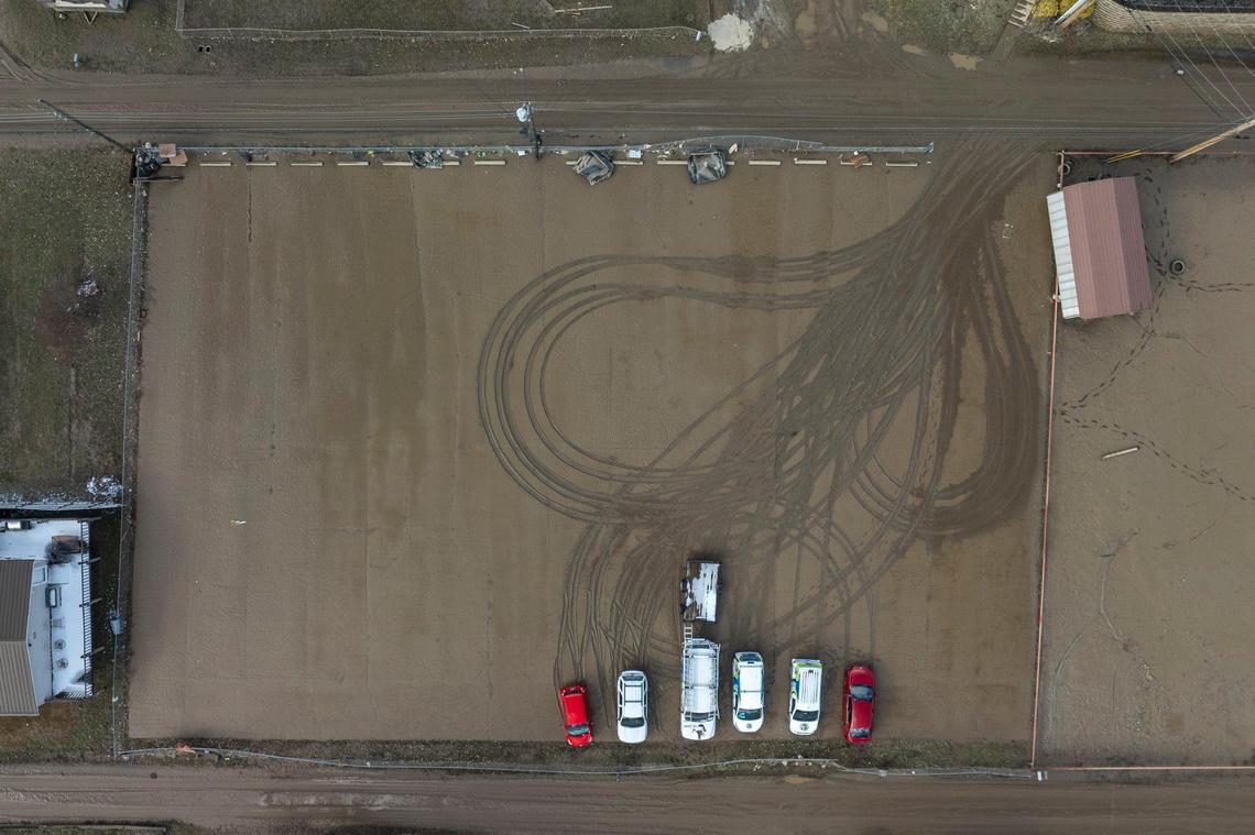 Mud covers a parking lot in Pike County, Ky., on Monday, Feb. 17, 2025. Heavy rainfall lead to flooding throughout Kentucky over the weekend.