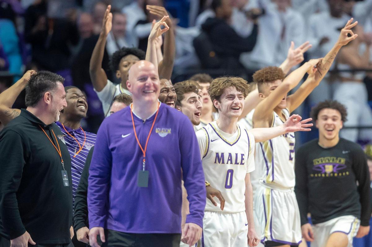 Coach Tim Haworth and the Male Bulldogs enjoyed the closing moments of their first-round victory over Breathitt County in the state tournament on Thursday.