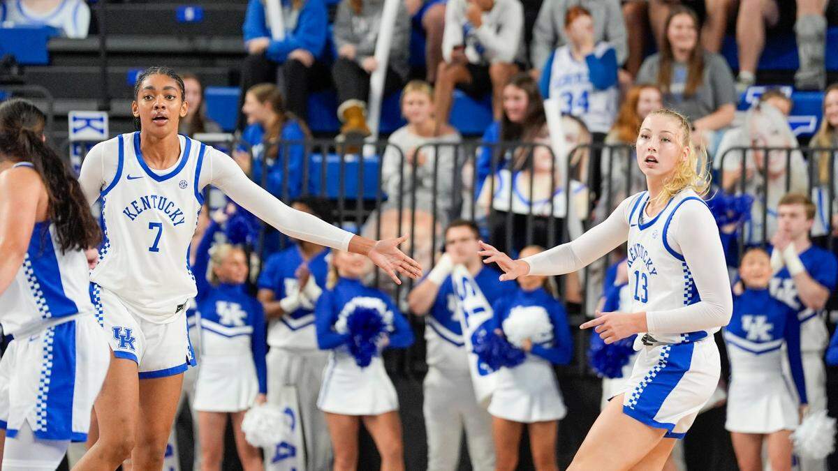 Kentucky forward Teonni Key (7) celebrates with center Clara Strack (13) after a basket against Northern Kentucky at Memorial Coliseum on Nov. 7.