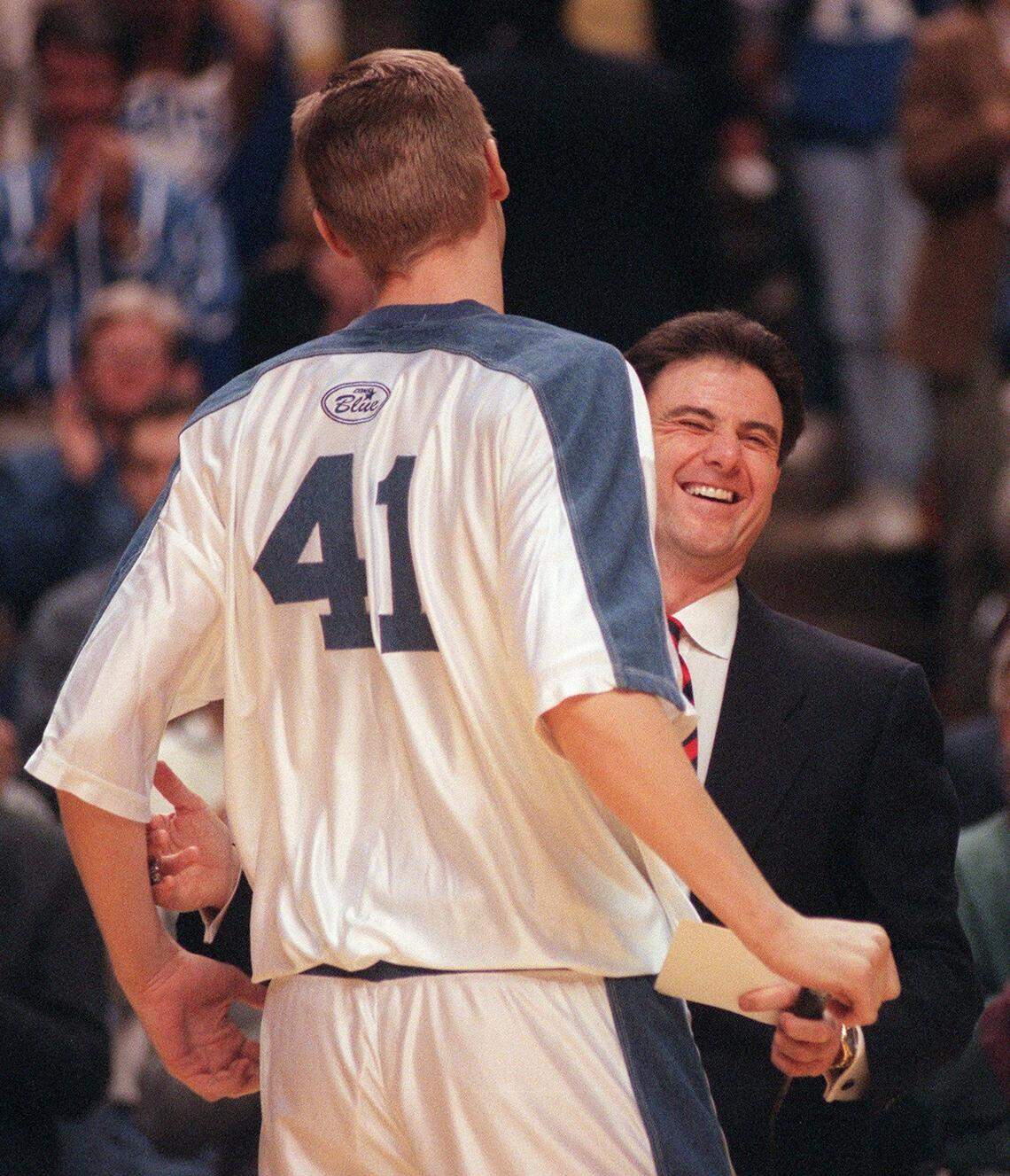 Kentucky coach Rick Pitino laughed with Mark Pope during the Cats’ Senior Night festivities in Rupp Arena in 1996.