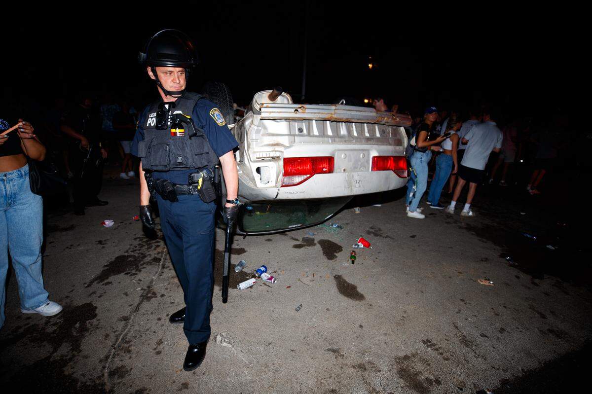 A vehicle was flipped on State Street Saturday night after the University of Kentucky Wildcats’ football win over the Florida Gators.